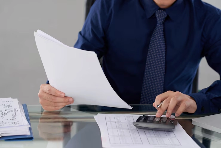الرئيسية 12 mid section anonymous male accountant calculating financial data 1098 19225